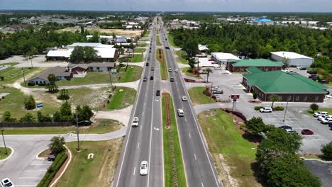 Above-The-South-Tyndall-Parkway-With-Cars-Driving-Along-The-Road-In-Panama-City,-Florida