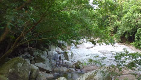 Santa-Marta,-Columbia-Waterfalls-in-the-Forest-Flowing-Over-Rocks-on-a-Beautiful-Day