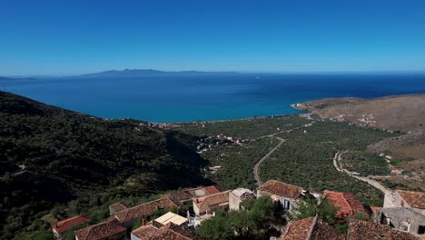 Stone-Houses-of-Qeparo-Panoramic-Village-on-Albanian-Coast,-Overlooking-the-Ionian-Sea-Like-a-Balcony