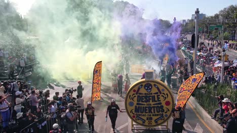 Aerial-of-Mexican-people-dressed-as-skeletons-parading-on-the-street-to-celebrate-the-Day-of-the-Dead-in-Mexico-City