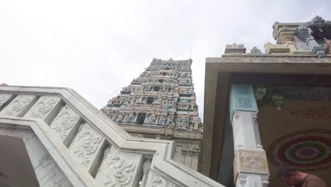 Looking-Up-At-Subramaniya-Swamy-Temple-Towering-Against-Sky-In-Coimbatore,-Tamil-Nadu,-India