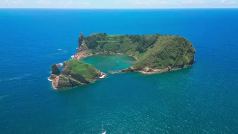 Vila-franca-islet-in-são-miguel-surrounded-by-blue-ocean,-aerial-view