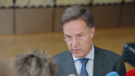 NATO-Secretary-General-Mark-Rutte-talking-to-the-press-at-the-European-Council-summit-in-Brussels,-Belgium---Close-up