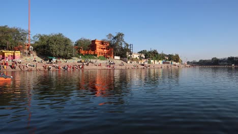 pristine-holy-Shipra-river-with-bright-blue-sky-at-morning-from-flat-angle-video-is-taken-at-shipra-river-ujjain-madhya-pradesh-india-on-Mar-09-2024