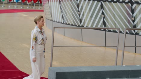 Prime-Minister-of-Denmark-Mette-Frederiksen-arriving-on-the-red-carpet-at-the-European-Council-summit-in-Brussels,-Belgium---Slow-motion