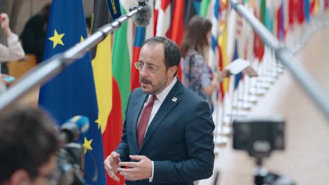 President-of-Cyprus-Nikos-Christodoulides-talking-to-the-press-at-the-European-Council-summit-in-Brussels,-Belgium---Slow-motion