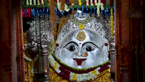 idol-of-hindu-holy-goddess-at-temple-from-flat-angle-video-is-taken-at-Gadkalika-Temple-ujjain-madhya-pradesh-india