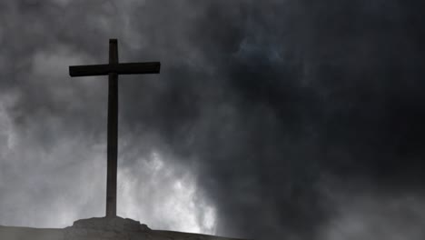 silhouette-of-a-wooden-cross-against-a-background-of-storm-and-black-clouds