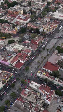 Drone-footage-of-the-surroundings-of-the-Basilica-of-Guadalupe,-vertical-mode