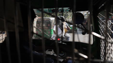 Experience-a-first-person-view-of-riding-a-CNG-vehicle-through-Dhaka's-bustling-streets