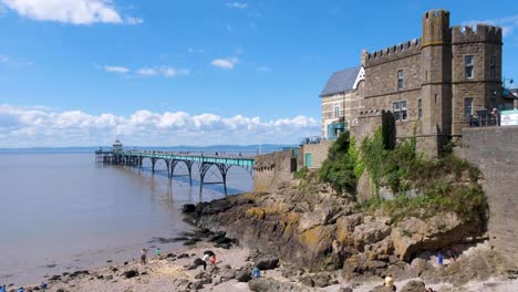 View-of-Clevedon-pier,-grade-1-heritage-listed-landmark-building,-overlooking-Severn-estuary-in-Somerset,-England-UK