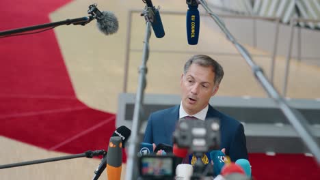Prime-Minister-of-Belgium-Alexander-De-Croo-talking-to-the-press-at-the-European-Council-summit-in-Brussels,-Belgium---Slow-motion