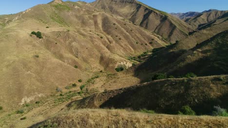 drone-shot-revealing-ranch-land-and-mountains