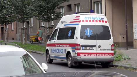 Volkswagen-Transporter-TDI-ambulance-car-of-Mestska-Nemocnice-Ostrava-hospital,-parked-on-street,-static-shot