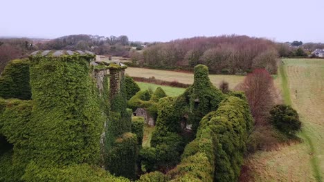 Dynamic-aerial-view-of-Menlo-Castle,-Galway,-pre-restoration