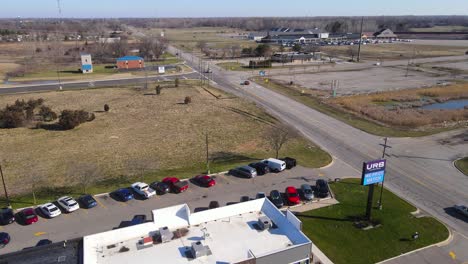 America-country-road-and-retail-stores,-aerial-drone-view