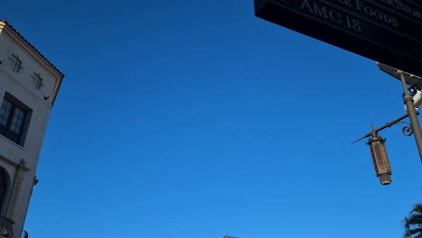 Airplane-Flying-Low-Above-Buildings-of-Town-Square-Shopping-Mall-Before-Landing-on-Las-Vegas-Airport,-Nevada-USA