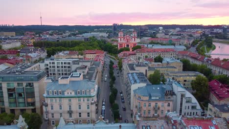 Vilnius-old-town-with-historic-buildings-church-tower,-aerial-skyline,-Europe