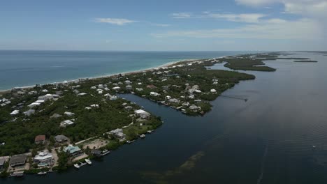 Drone-footage-flying-over-private-residential-island-in-Florida
