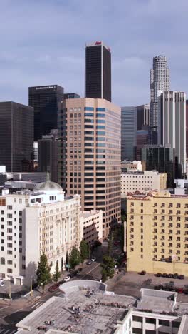 Vertical-Drone-Shot,-Downtown-Los-Angeles-USA-Skyscrapers-and-Towers-on-Sunny-Day