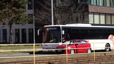 Iveco-Crossway-LE-Line-12M-intercity-bus-of-Transdev-public-transportation-company-in-Ostrava,-panning-shot