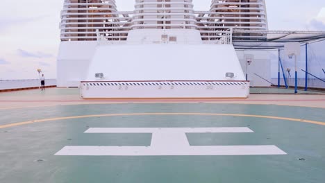 Tilting-Up-Shot-Of-Helipad-On-The-Cruise-Ship-At-Daylight