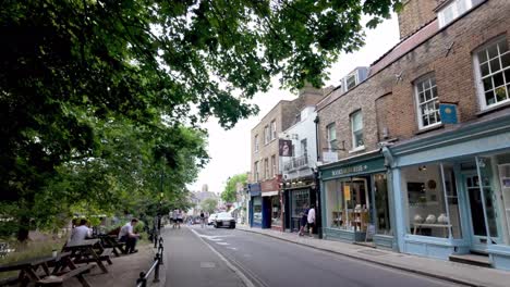 Richmond,-London:-Exploring-the-shops-and-restaurants-of-High-Street,-enjoying-the-vibrant-atmosphere-and-diverse-offerings