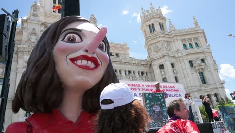 A-large-figure-depicting-the-Spanish-politician-and-serving-president-of-the-Community-of-Madrid,-Isabel-Díaz-Ayuso,-is-seen-during-a-protest-to-defend-public-healthcare-in-Spain