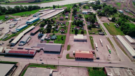 Overhead-aerial-showing-three-livestock-trailers-with-trucks-parked-in-an-industrial-parking-lot