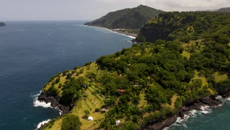 Aerial-drone-footage-captures-the-Bukit-Asah-peninsula's-beauty-in-Karangasem,-Bali