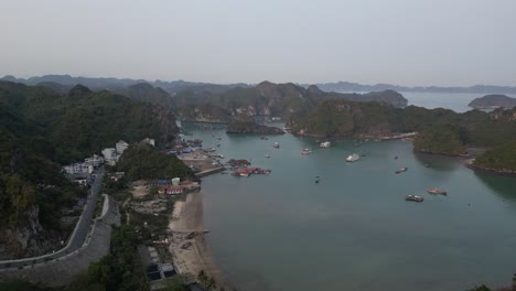 drone-shot-flying-towards-fishing-harbor-in-Cat-Ba-and-Halong-Bay-in-Northern-Vietnam