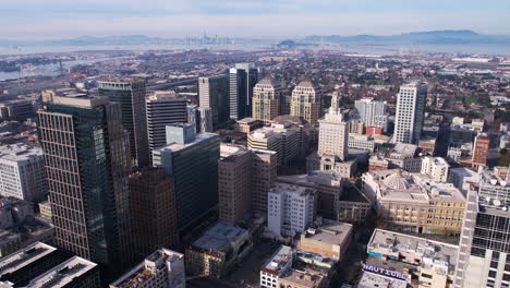 Downtown-Oakland-California-USA-Buildings,-City-Hall-and-Central-Towers,-Establishing-Drone-Shot