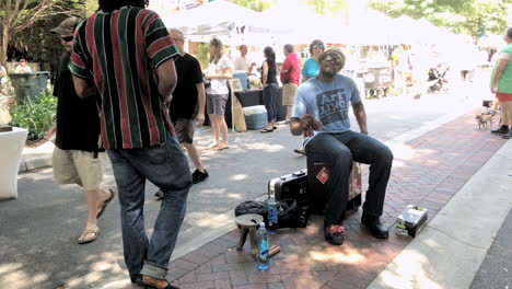 saturday-market-where-people-sell-their-own-homemade-stuff-in-stalls-as-people-walk-with-their-dogs-and-loved-ones-buying-breakfast-and-lunch