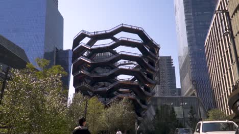 Approaching-Hudson-Yards-Vessel-from-distance-in-slow-motion-during-sunny-day-in-New-York-City,-Manhattan