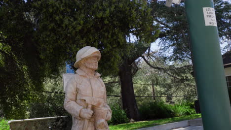 Small-sculpture-of-a-firefighter-near-fire-station-67