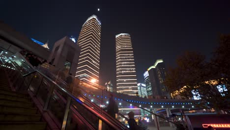 Illumination-of-Shanghai-IFC-Twin-Towers-at-night,-China