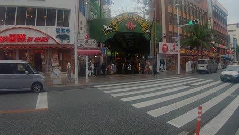 Pedestrian-Crossing-Outside-Street-Market-at-Kokusai-Dori