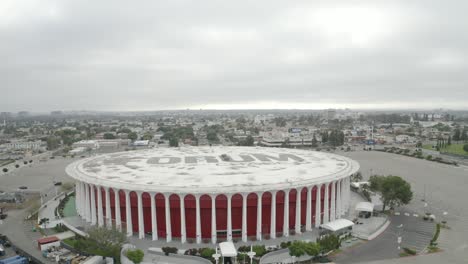 Beautiful-aerial-fly-over-The-Forum-during-a-cloudy-afternoon-in-Los-Angeles