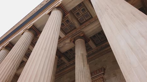 Upward-shot,-scenic-view-of-the-sealing-exterior-design-and-column,-Academy-of-Athens