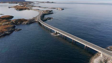 One-of-the-Atlantic-road-bridges-spanning-over-the-waters-of-the-sea,-connecting-small-islands