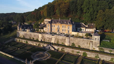 AERIAL:-Shot-of-Chateau-Neercanne-bathing-in-the-morning-sun