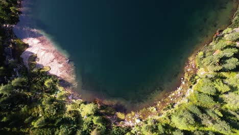 Lake-in-the-Dolomites-Flat-Lay-filmed-with-drone-Location-Name:-Puntleider-See