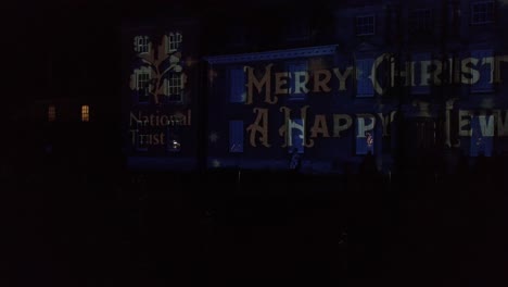 National-Trust-Happy-Christmas-and-Happy-New-Year-at-night-light-projection