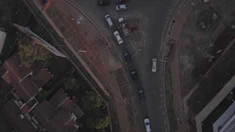 Top-down-aerial-video-of-busy-roundabout-in-Nairobi,-Kenya