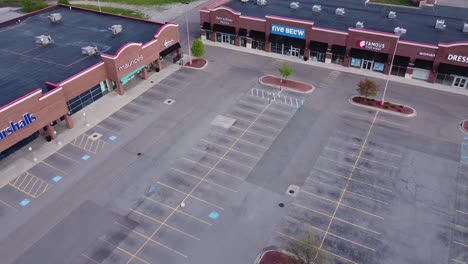 Empty-Outlet-Stores-Due-to-Corona-Virus-Quarantine-Measures,-Brownstown-Michigan---aerial-shot