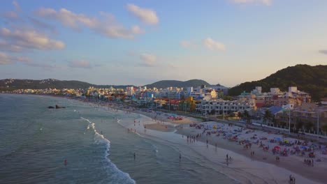 Aerial-jib-up-shot-flying-towards-Bombas-y-Bombinhas-at-golden-hour-in-Brazil