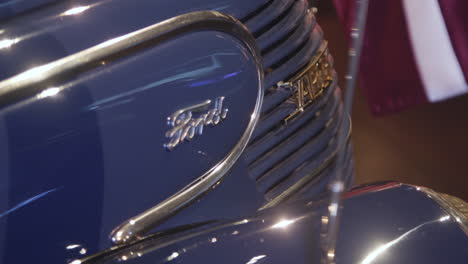 The-hood,-bonnet-of-an-antique,-blue,-retro-car-Ford-Vairogs