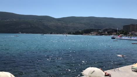 People-enjoying-in-sunny-day-in-Herceg-Novi,-Montenegro