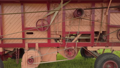 A-working-vintage-steam-powered-hay-baler-in-action