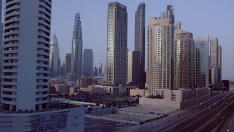 Dubai-Downtown-skyline-timelapse-day-time-with-towers-from-the-top-in-Dubai,-United-Arab-Emirates